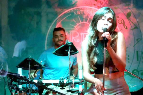 Live music and outdoor seating at Green Room Café in Jaco Beach, Costa Rica