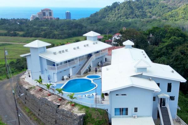 Sky house aerial pool ocean view