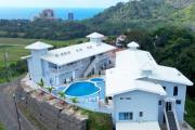 Sky house aerial pool ocean view