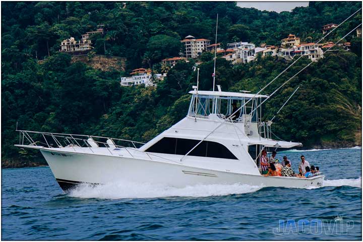 Angle view of party boat in costa rica with guests aboard