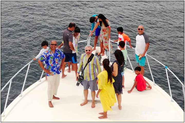 family group on deck of a party boat