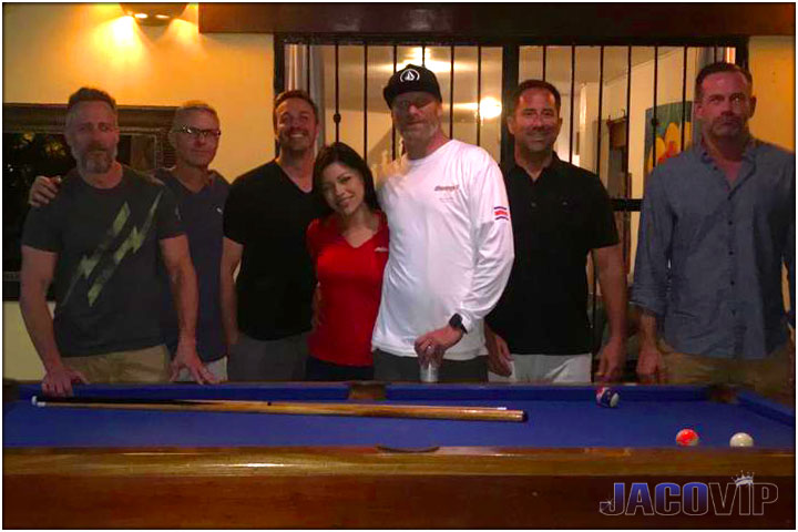 Group of guys with Jaco VIP concierge girl at pool table