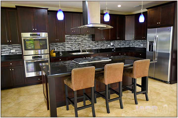 Bar stools facing the island in kitchen
