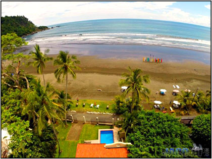 Aerial view of house and ocean