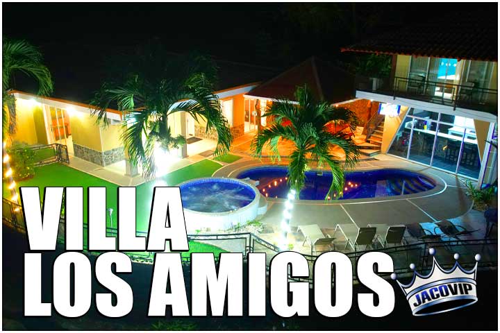 Night drone photo of Villa Los Amigos in Jaco