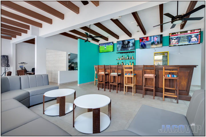 Living room and party area at Jaco Oasis