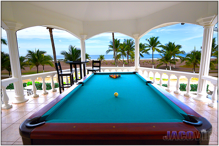 Pool table and view of sand and ocean