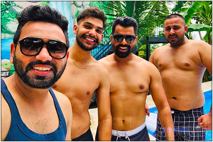Four guys at the pool