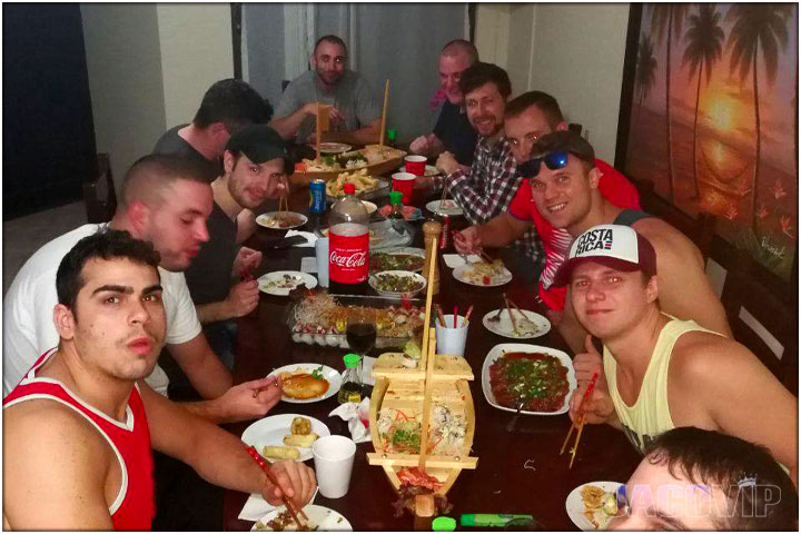 Group of guys having diner