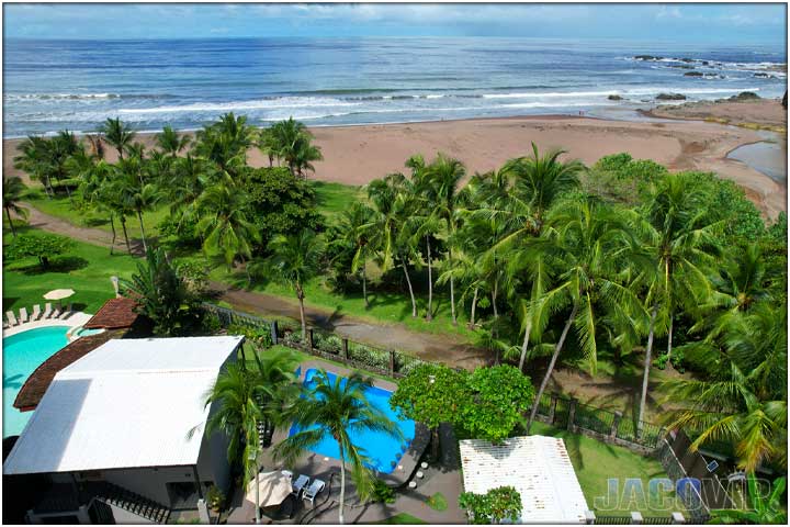 aerial drone photo of casa 1 with swimming pool and Jaco Beach