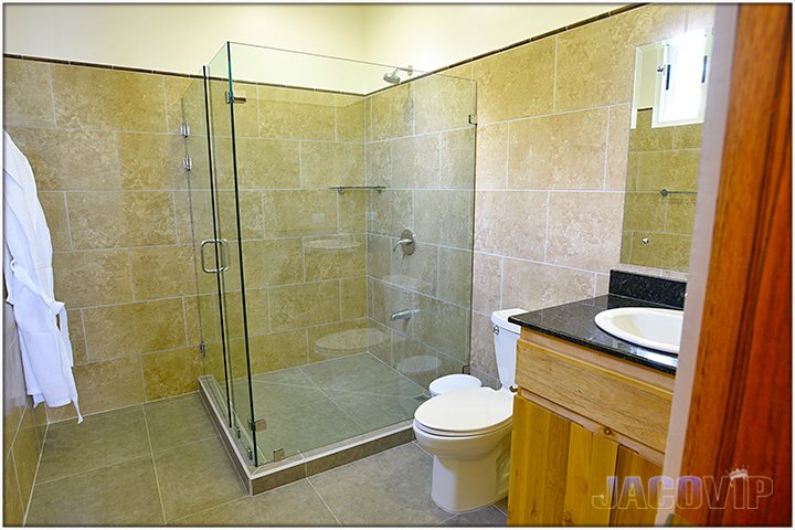 En suite bathroom with new modern tiles