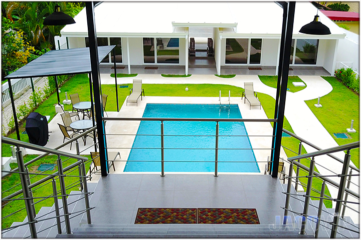 view of pool from second floor balcony