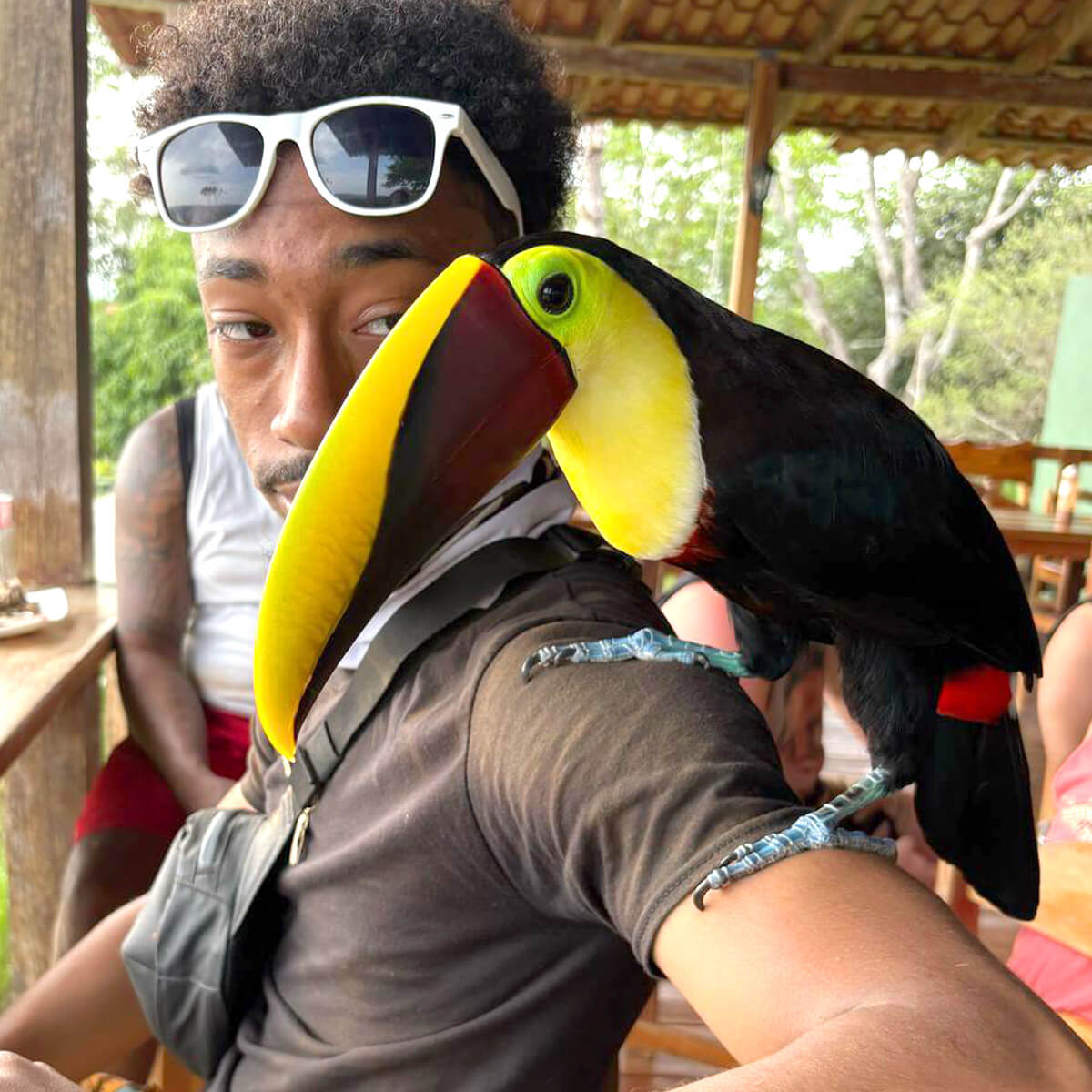 JacoVIP guest with a live Toucan on his shoulder