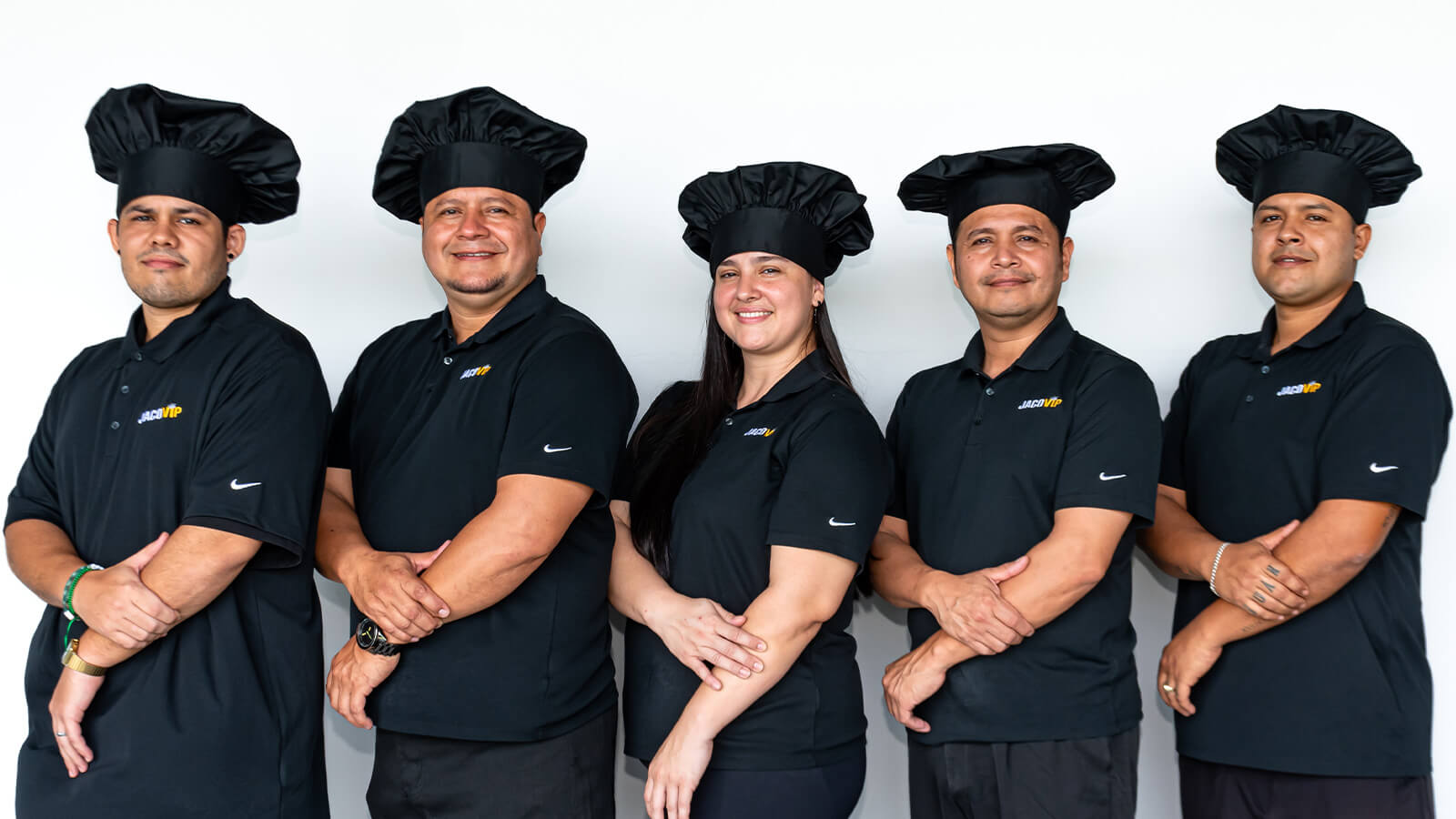 JacoVIP chefs in uniform posing by the office test kitchen