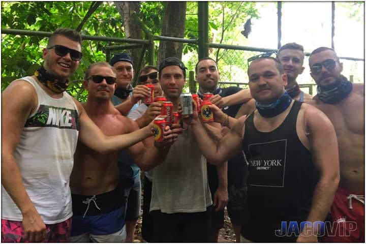 Bachelor party group gaving a beer after atv tour