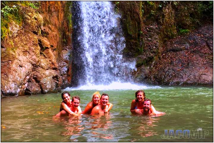 Gamalotillo waterfall in Costa Rica with 3 couples in natural pool below