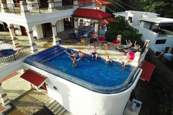 Aerial view of pool party at Casa Bisily in Hermosa Beach