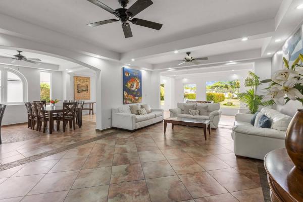 large living room with dark tile