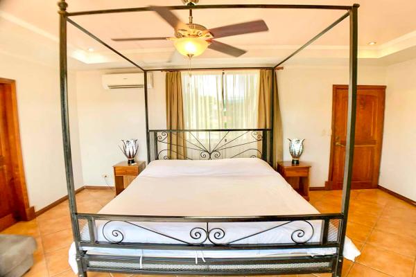 Bedroom 1 at Casa Cuatro Jaco with king bed