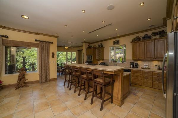 View of the kitchen and the dining bar at Casa Oasis