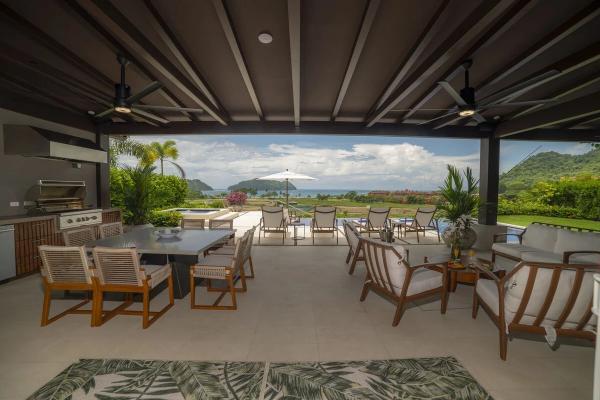 Outdoor living and dining area with ocean view