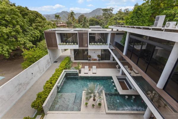 Private pool with mountain backdrop Casa Sirena beachfront villa Jaco