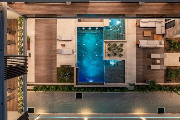 Aerial drone view of Casa Sirena pool Jaco Beach Costa Rica