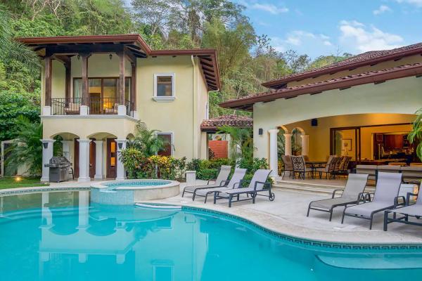 View of the pool and back patio at Casa Tropical