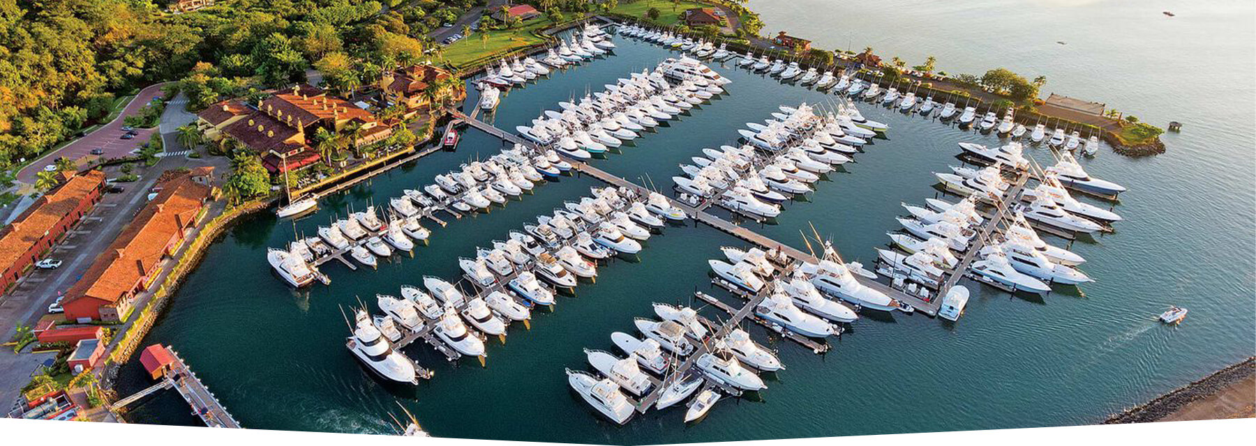 Aerial drone view of Los SueƱos Marina in Herradura Bay, Costa Rica, home to world-class fishing charters.