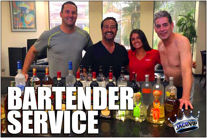 Jaco VIP bartender with guests at North Beach Villa