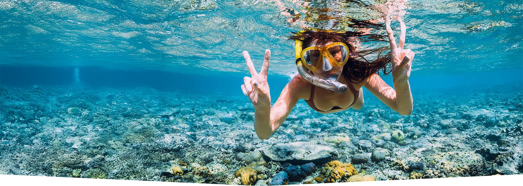 Girl snorkeling in Costa Rica clear water