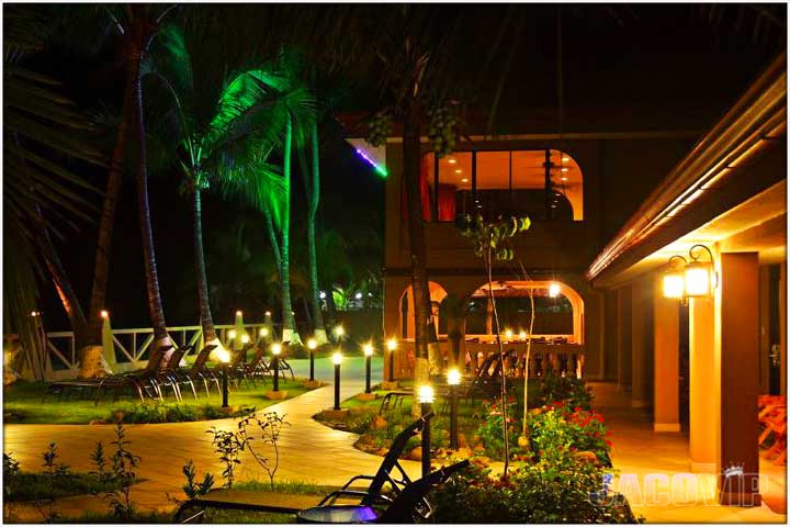 Night time view of restaurant building and jaco beach
