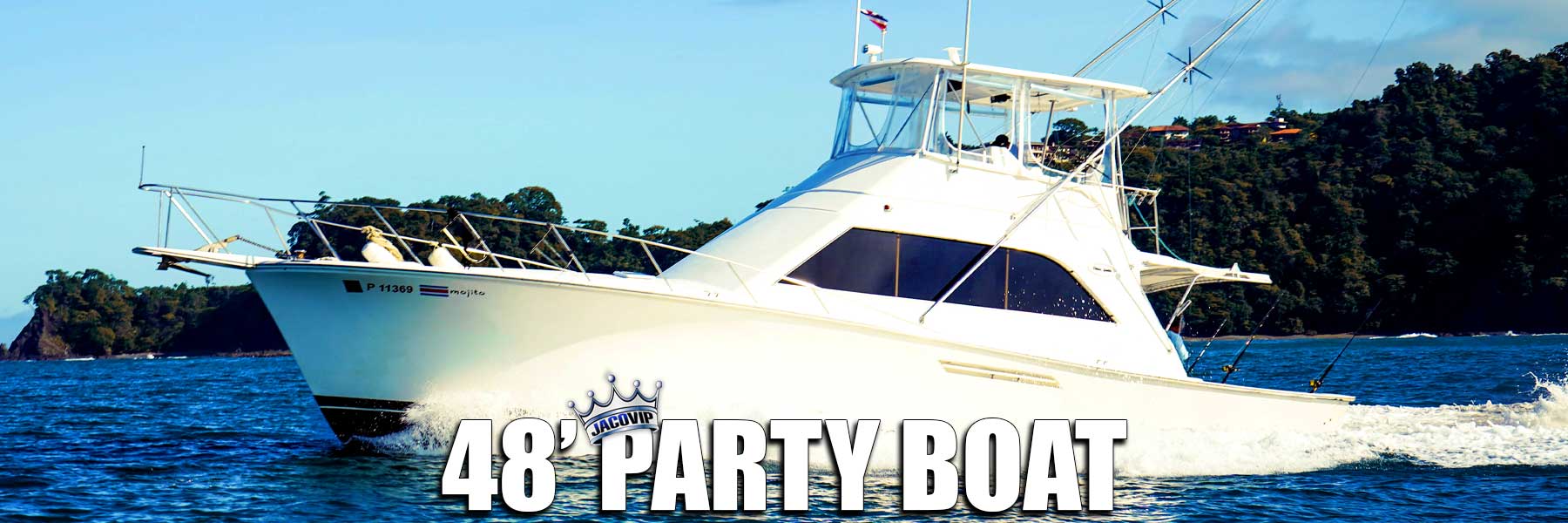 Jaco VIP party boat moving fast on ocean in front of Los Sueños