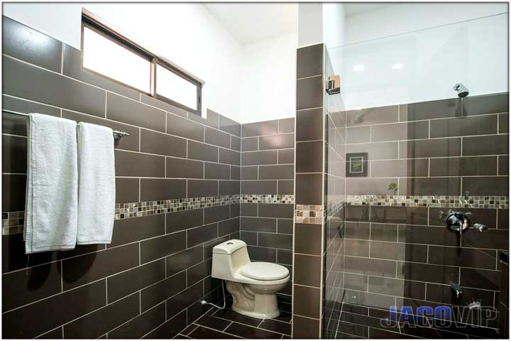 new bathroom with grey tiles