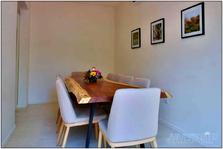 Dining table custom made with natural wood edge