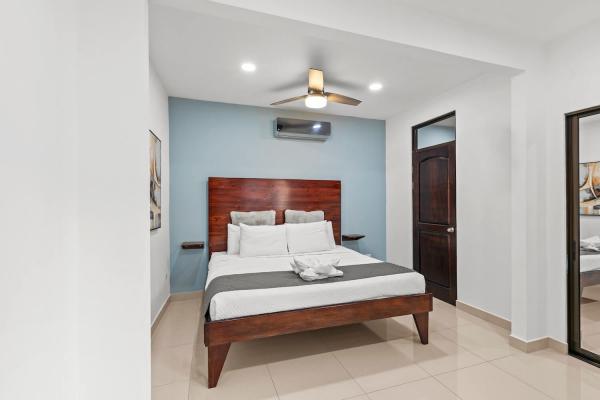 Bedroom 1 with king bed at Lime House in Jaco Costa Rica