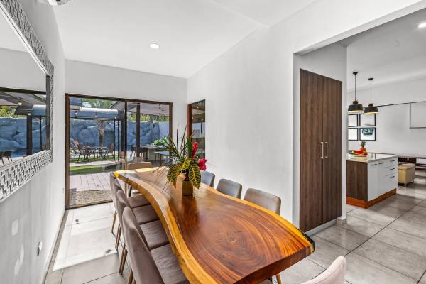 Large natural wood dining table at Lime House La Limonera