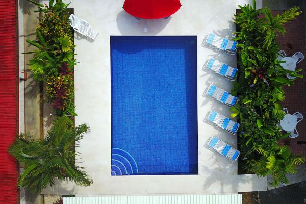overhead view of pool and lounge chairs
