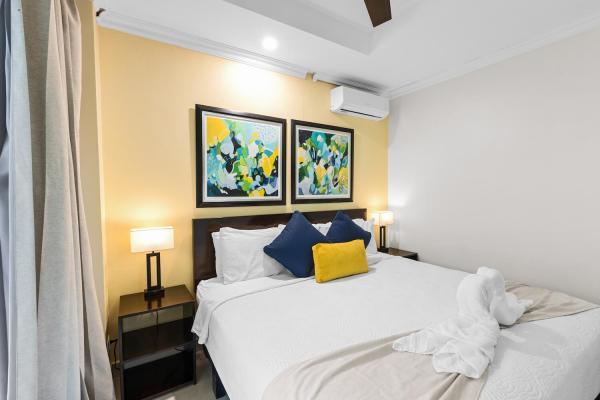 Bedroom eight on the fourth floor with king bed