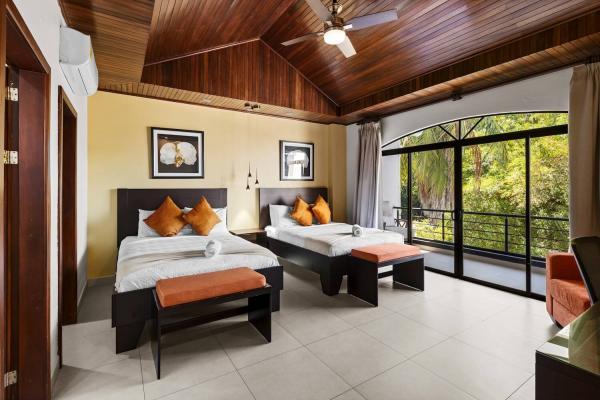 Bedroom eleven on the fourth floor with two queen beds