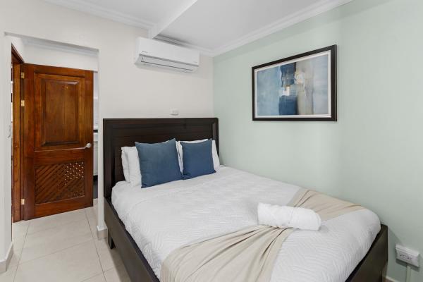 Bedroom four on the second floor with queen bed