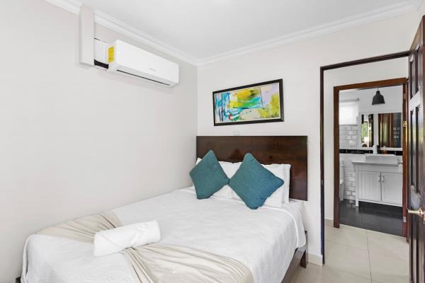 Bedroom six on the third floor with queen bed