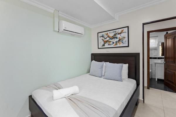 Bedroom three on the second floor with queen bed