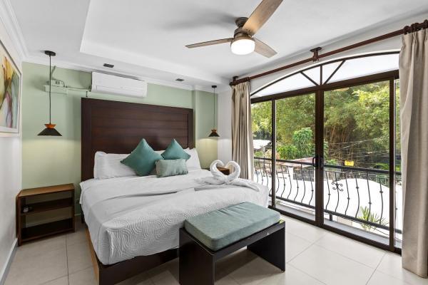 Bedroom two on the second floor with king bed and view