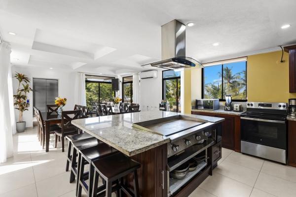 Third floor gourmet kitchen with granite island