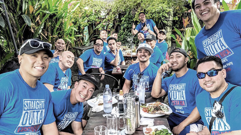 Group of friends celebrating a bachelor party at a Jaco Beach villa pool