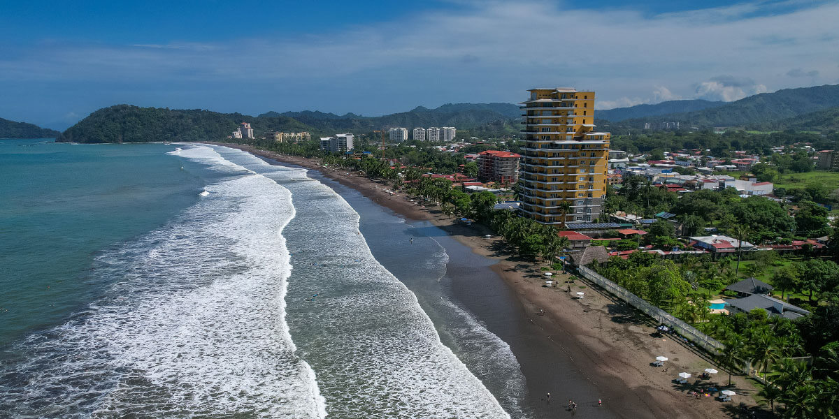 Aerial view of Jaco Beach Costa Rica showing 4 kilometers of coastline and town