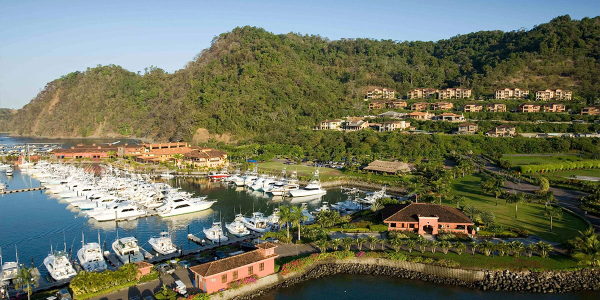 Aerial view of Los Sueños Marina and resort with sport fishing fleet at Herradura Costa Rica