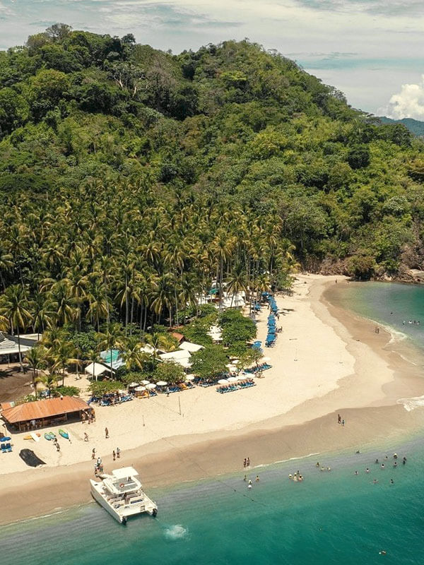 Aerial view of white sand beach and turquoise water at Tortuga Island Costa Rica