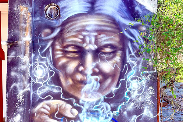 Mystical figure mural art in Jaco Beach Costa Rica
